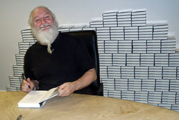 Robert signing books